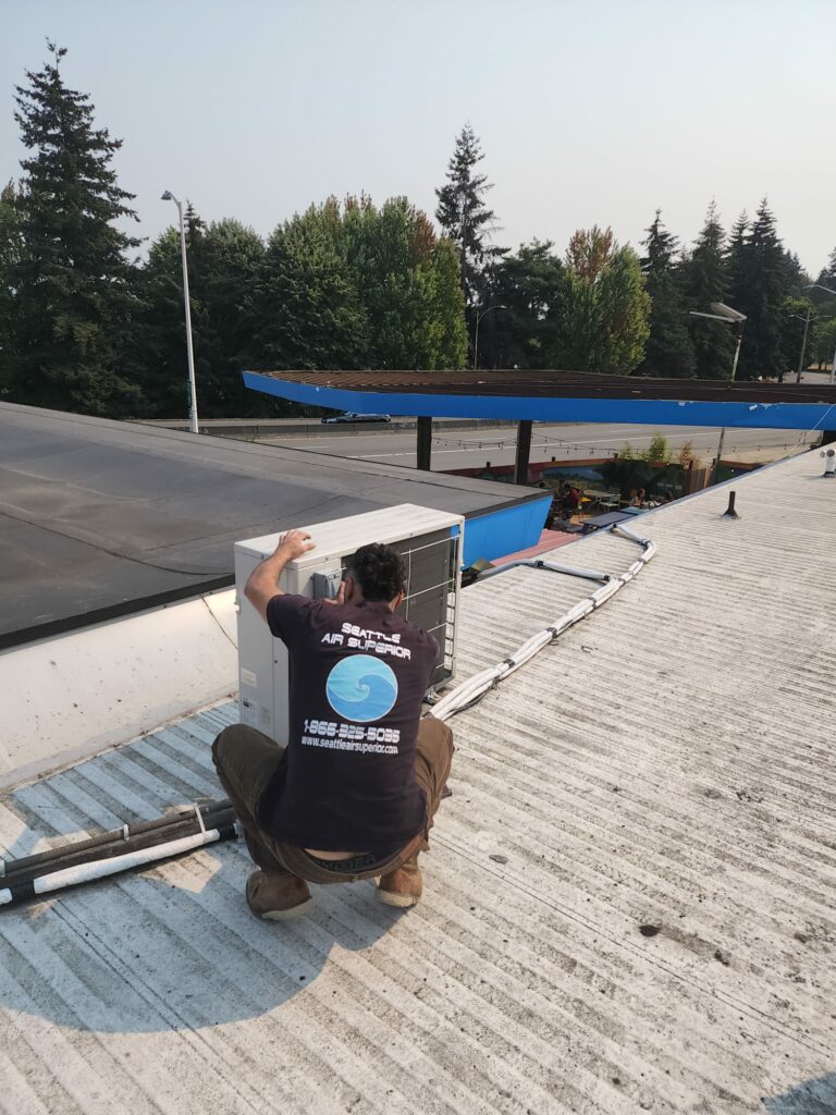 Commercial Air Conditioning Unit Maintenance by seattle air superior Technician on Rooftop