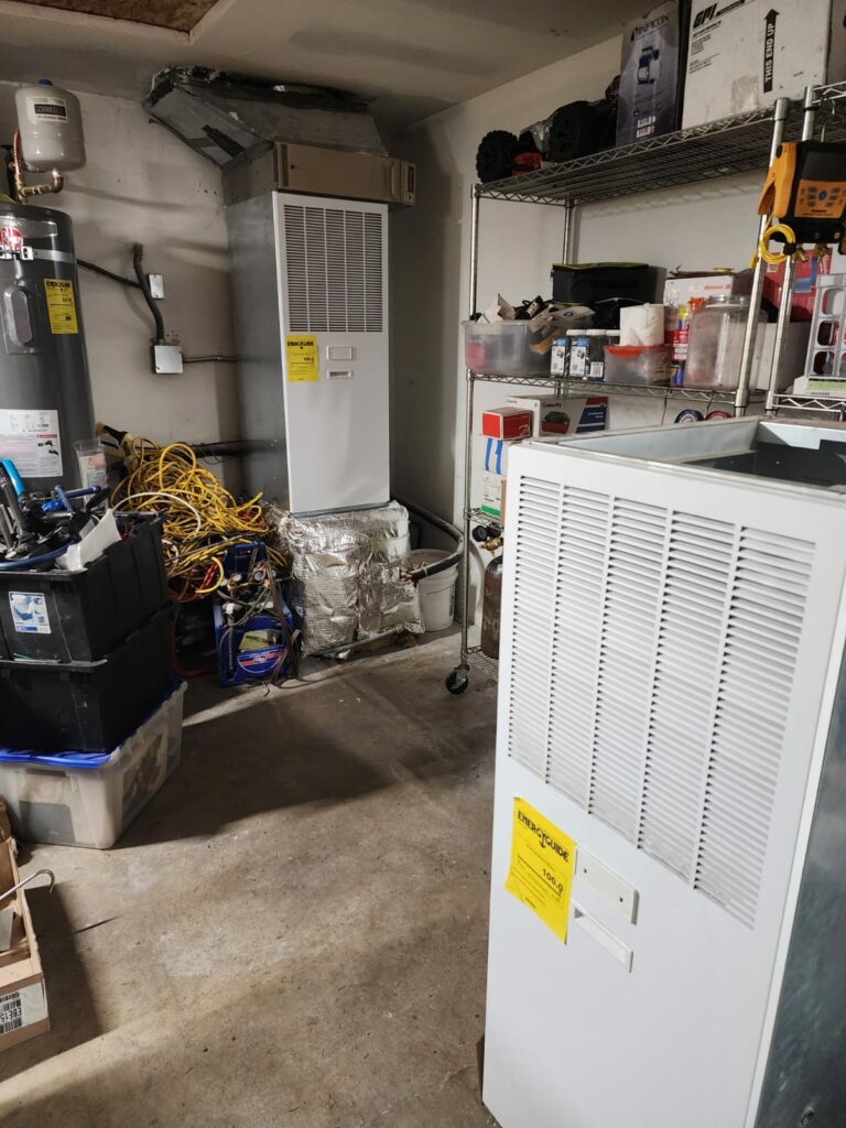 Organized Residential Garage with HVAC and Water Heating System
